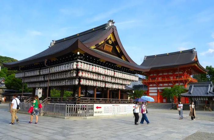 The Yasaka Shrine in Kyoto, Japan, was typically bustling with tourists and surrounded by street vendors.