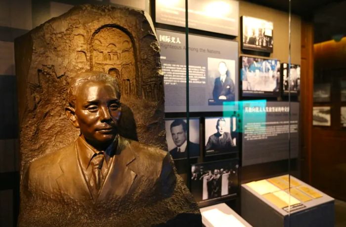 A statue of Dr. He Fengshan, often dubbed 'the Chinese Schindler' for his efforts in helping Jewish refugees escape Nazi persecution, is prominently displayed at the Shanghai Jewish Refugees Museum.