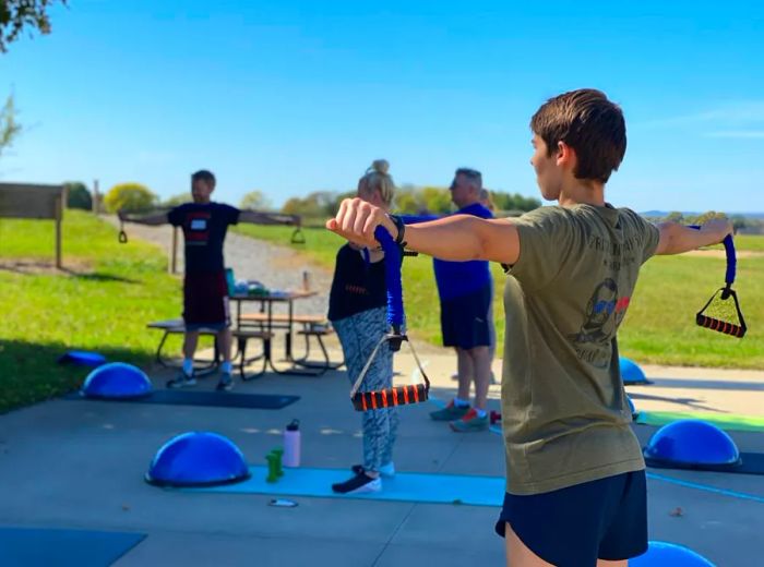 Participants engage in exercise during a Fit Farm retreat.