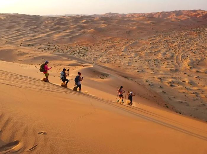 UAE Trekkers offers a sunset trek across the Liwa Desert in Abu Dhabi, a stunning location featured in ‘Dune Part Two.’