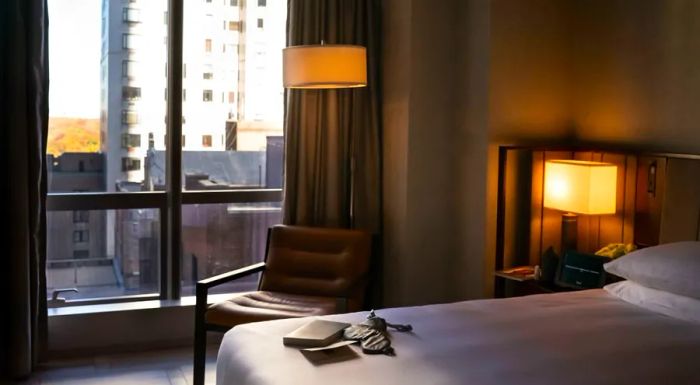 The Sleep Suite at Park Hyatt New York features a king-sized Restorative Bed by Bryte, along with sleep-enhancing amenities like essential oil diffusers, Nollapelli linens, and sleep masks to ensure a restful stay.