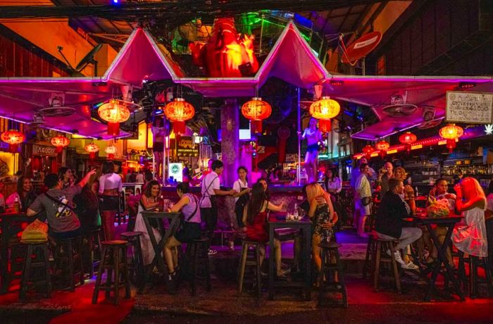 On September 30, patrons enjoy themselves at a bar in Phuket, Thailand.