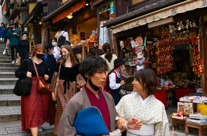 On October 11, pedestrians were seen strolling through a popular shopping street in Kyoto, Japan.