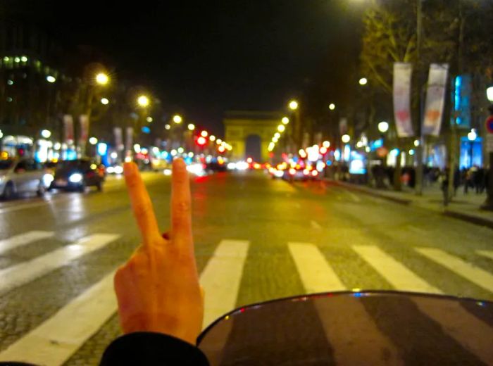 Michelle snapped this photo from the back of Augustin's moped on their first date in Paris.