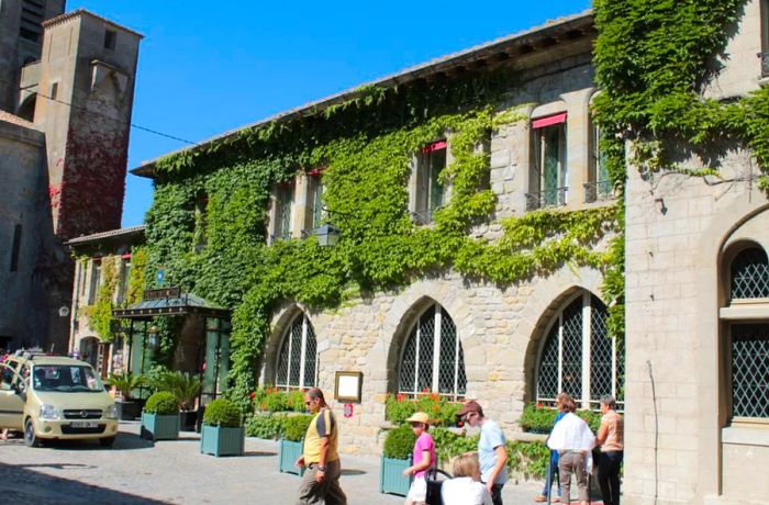 Hotel de la Cite sits within the Medieval fortress of Carcassonne, a UNESCO World Heritage site known for its historical significance.