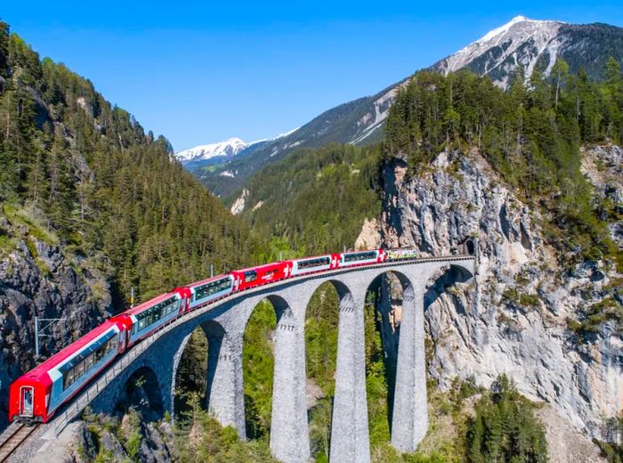 The Bernina Express connects the upscale alpine resort of St. Moritz with the Italian town of Tirano.