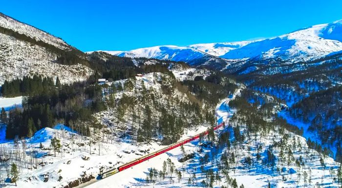 The Oslo-Bergen railway journeys through some of the most dramatic highland terrain.