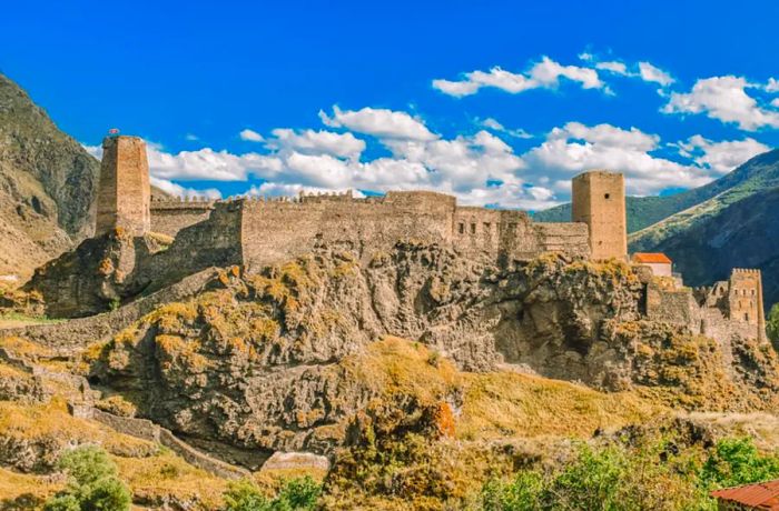 Khertvisi Fortress stands as a medieval castle sprawling across a rocky outcrop.