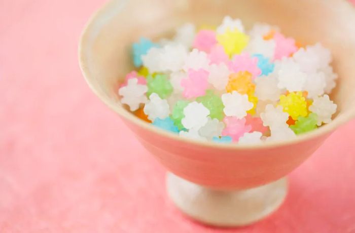 A bowl filled with vibrant konpeito candies.