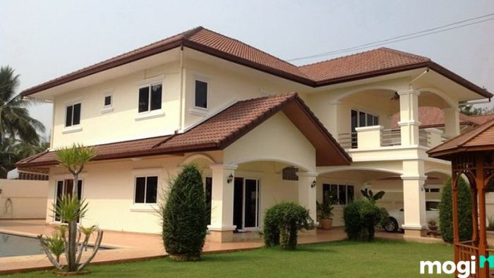 Mô hình nhà vườn 2 tầng tích hợp garage ô tô trong thiết kế của ngôi nhà.