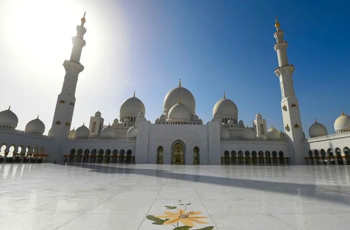 The mosque’s main courtyard is an architectural marvel, composed of 30 million individual pieces of marble.