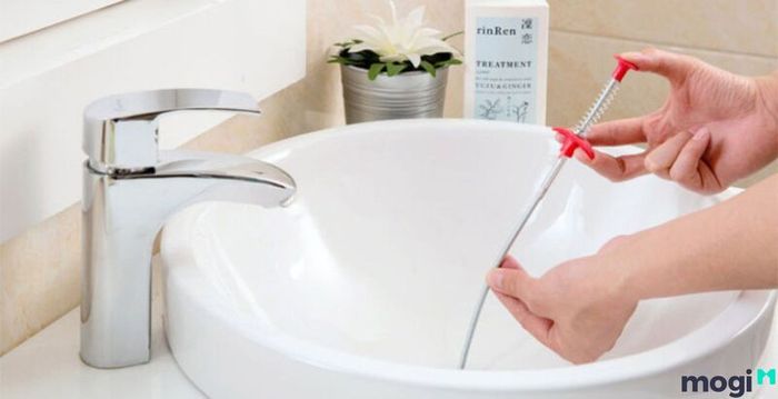 thông tắc chậu rửa mặt