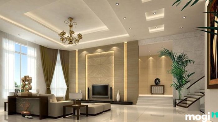 Trần thạch cao nổi cho phòng khách là kiểu trần được lắp đặt trên một hệ thống khung xương, tạo ra một khoảng không gian giữa trần và lớp trần thạch cao, mang lại vẻ đẹp và sự tiện dụng cho không gian sống.