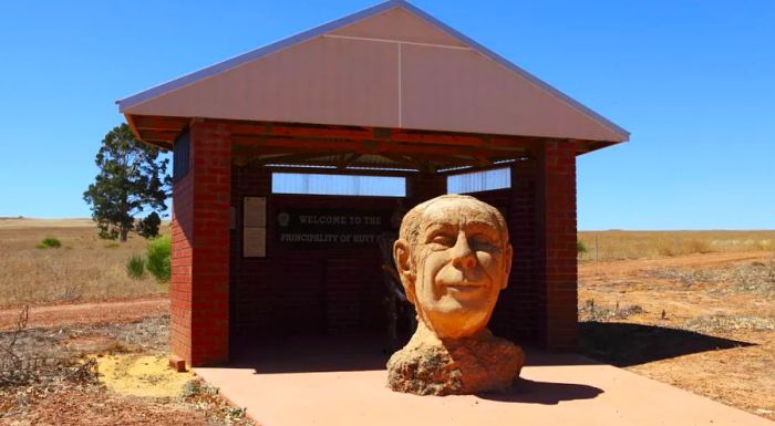 A large bust of Prince Leonard, carved from rock by a Canadian artist, stands as one of the principality’s notable sculptures.