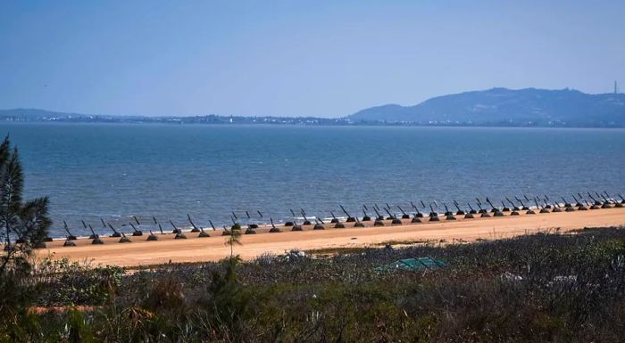 Anti-tank barricades line Guningtou beach, serving as a permanent reminder of Kinmen's military past.