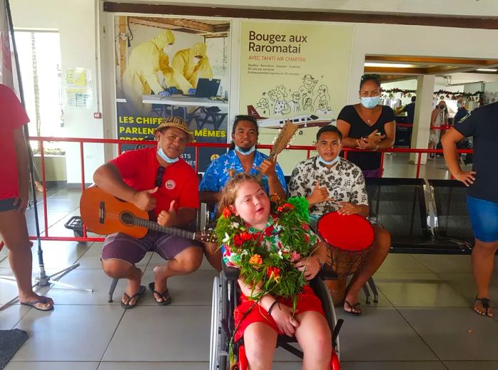 Mathias was welcomed with flowers and music when he arrived on Raiatea.