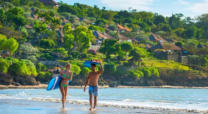 Tropicsurf, a luxury surf company, offers lessons at the serene Jimbaran Bay.