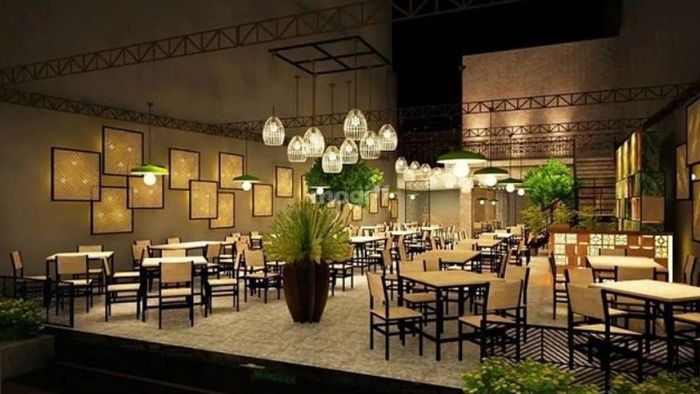 Trang trí trần quán cafe với đèn chùm giúp tạo không gian ấm áp, thân thiện và đầy lôi cuốn cho khách hàng.