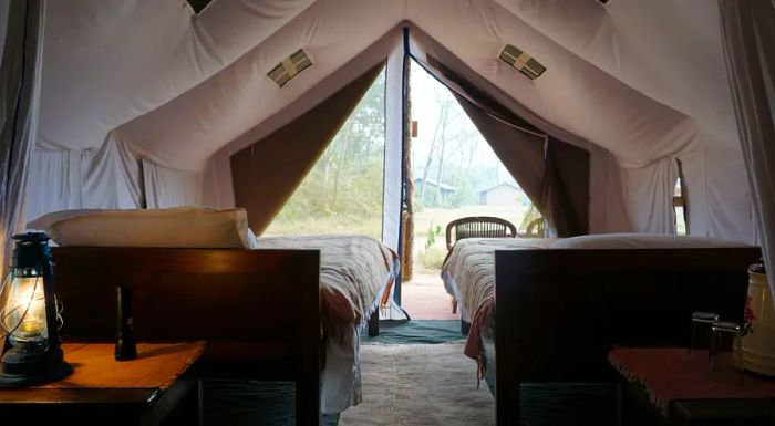 A twin-bed safari tent at Nepal's Tiger Tops retreat.