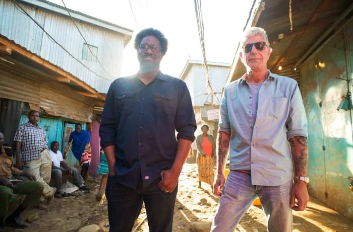 Nairobi, Kenya: Anthony Bourdain with W. Kamau Bell in the heart of the Kibera slums, while filming the 12th season of 'Parts Unknown'.