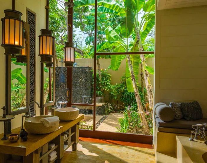 The Four Seasons Resort Langkawi: A stunning blend of soaring arches, bright skylights, and outdoor soaking tubs.