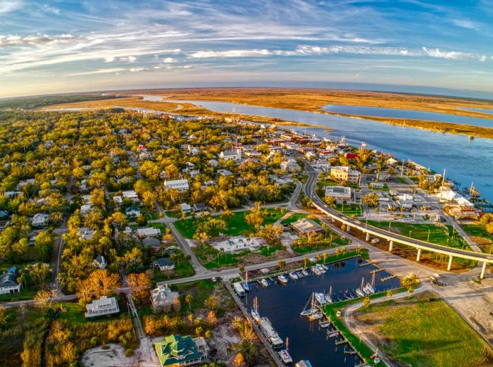 Aerial view of a seaside town during the day.