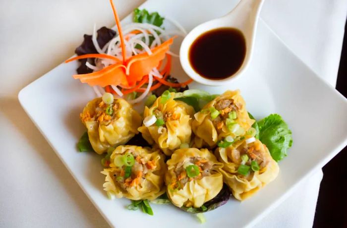 Siomay is a close relative of the Cantonese dim sum dish, shumai.