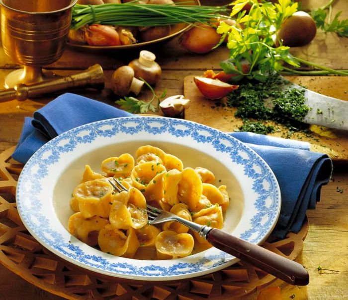 Pelmeni are savory, not sweet, dumplings typically filled with meat and seasoned with bold flavors.