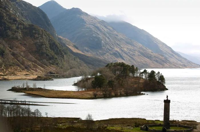 The Glenfinnan Monument, with Loch Shiel as its backdrop, stands in for the Black Lake in the Harry Potter films.