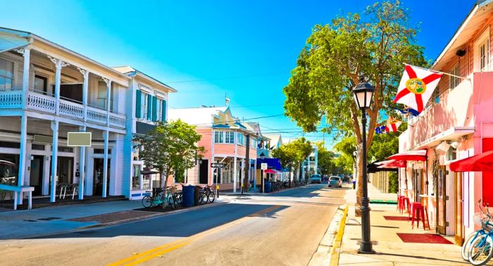 Duval Street, the vibrant main strip of Key West, is lined with key lime pie vendors, street carts, and quirky shops that embody the island's unique charm.