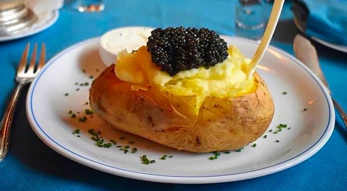 The famous caviar-topped baked potato from Caviar Kaspia in Paris