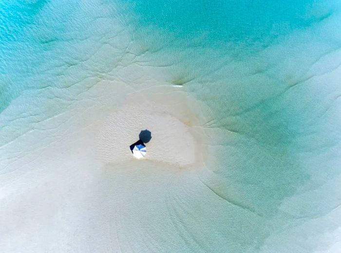 Amanpulo offers extraordinary dining experiences, including a unique picnic on a remote sandspit.