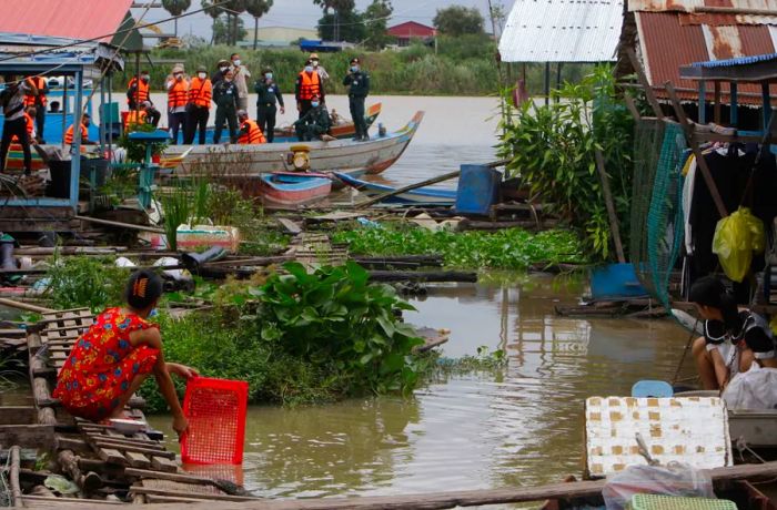 Local authorities have instructed villagers to tear down their floating homes along the Tonle Sap River near Prek Pnov village in Phnom Penh, Cambodia, on June 12.