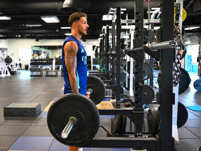 Incorporating weight training into your daily routine is essential for keeping your strength up. Here, Arsenal soccer star Ben White trains at the Los Angeles Rams' facility on July 23 in Thousand Oaks, California.