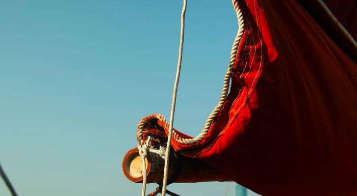 The color of a junk’s sails once reflected a family’s social standing. Wealthier fishing families could afford sails made from higher-quality brown or red fabric.