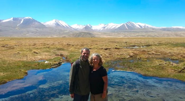 Lee and Mandy have spent over two decades traveling together, including trips to places like Tajikistan, as seen in this photo.