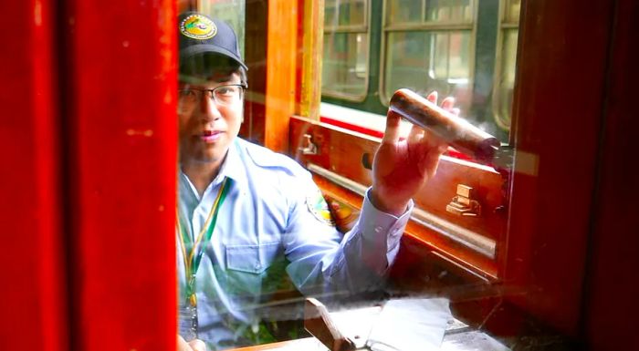 Liao Yuan-chao, the train captain of Alishan Forest Railway.