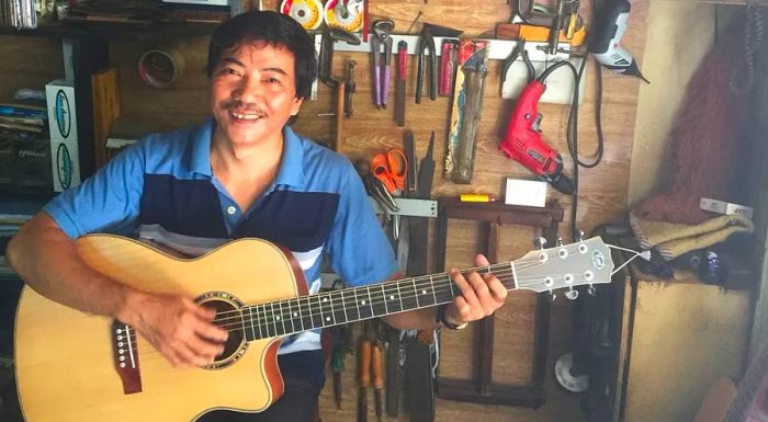 Ton That Anh, co-owner of Duy Ngoc Guitars, is concerned about the declining standards on Saigon's famed 'Guitar Street.'