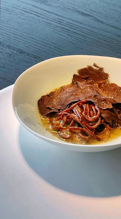 Mosu Hong Kong serves one of chef Sung’s standout dishes, Acorn Noodles with Black Truffles, which was showcased on 'Culinary Class Wars.'