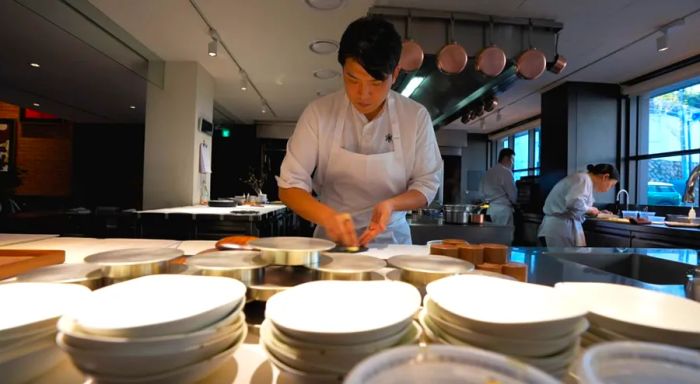 Chef Sung gets ready for service at Mosu Seoul.