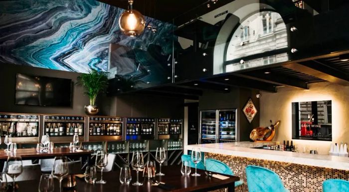 This trendy bar offers a selection of around 100 wines by the glass, perfect for wine enthusiasts.