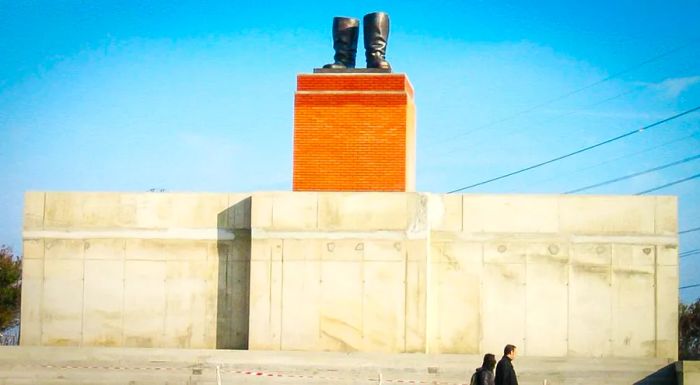 A replica of the Stalin statue, once towering over the city, now reduced to only his boots after the original was torn down.