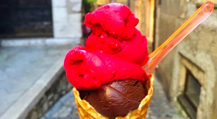 French ice cream is known for its richness, surpassing the lighter texture of its Italian counterpart.