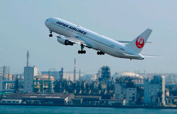 A Japan Airlines passenger jet departs from Haneda Airport in Tokyo. The Japanese government provides clear instructions to its citizens on what to do if they find themselves caught in an active shooter situation in the United States.