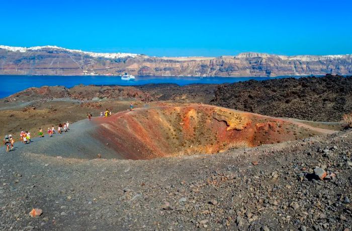 Tourists can embark on boat trips to Nea Kameni, home to an active volcano.