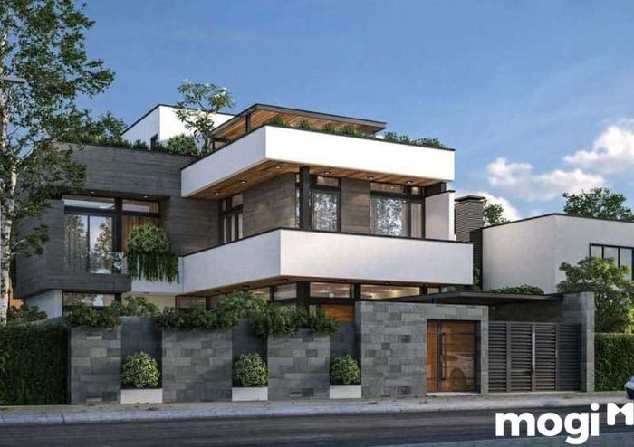 Đá là vật liệu thiết kế tường rào biệt thự hiện đại phổ biến, nổi bật với sự bền vững và khả năng tạo điểm nhấn cho không gian sống.