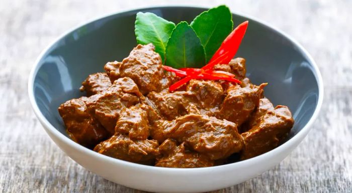 Beef rendang is incredibly tender, with the meat simmered in a dry curry sauce that has been slow-cooked for hours to perfection.