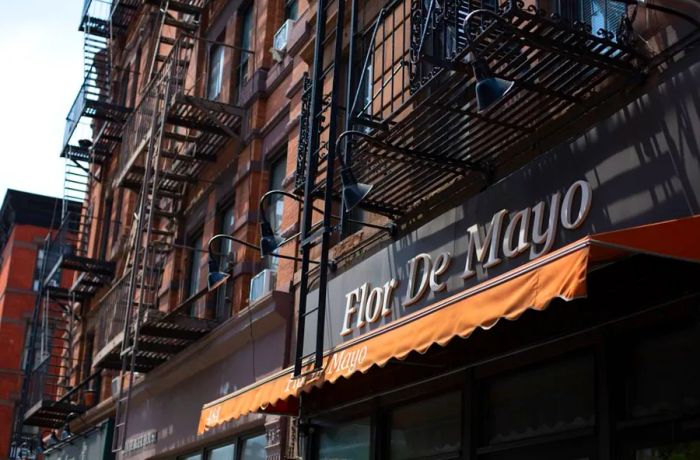 The exterior of one of Flor De Mayo's three locations in New York City.