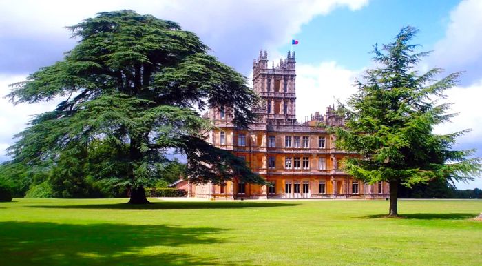 The majestic Lebanon Cedar (pictured on the left) was brought to Highclere by the renowned landscaper, Lancelot Brown.