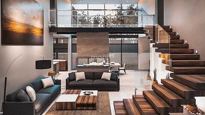 Màu nâu đen kết hợp khéo léo mang đến vẻ sang trọng cho mẫu nhà 30m2 có gác lửng